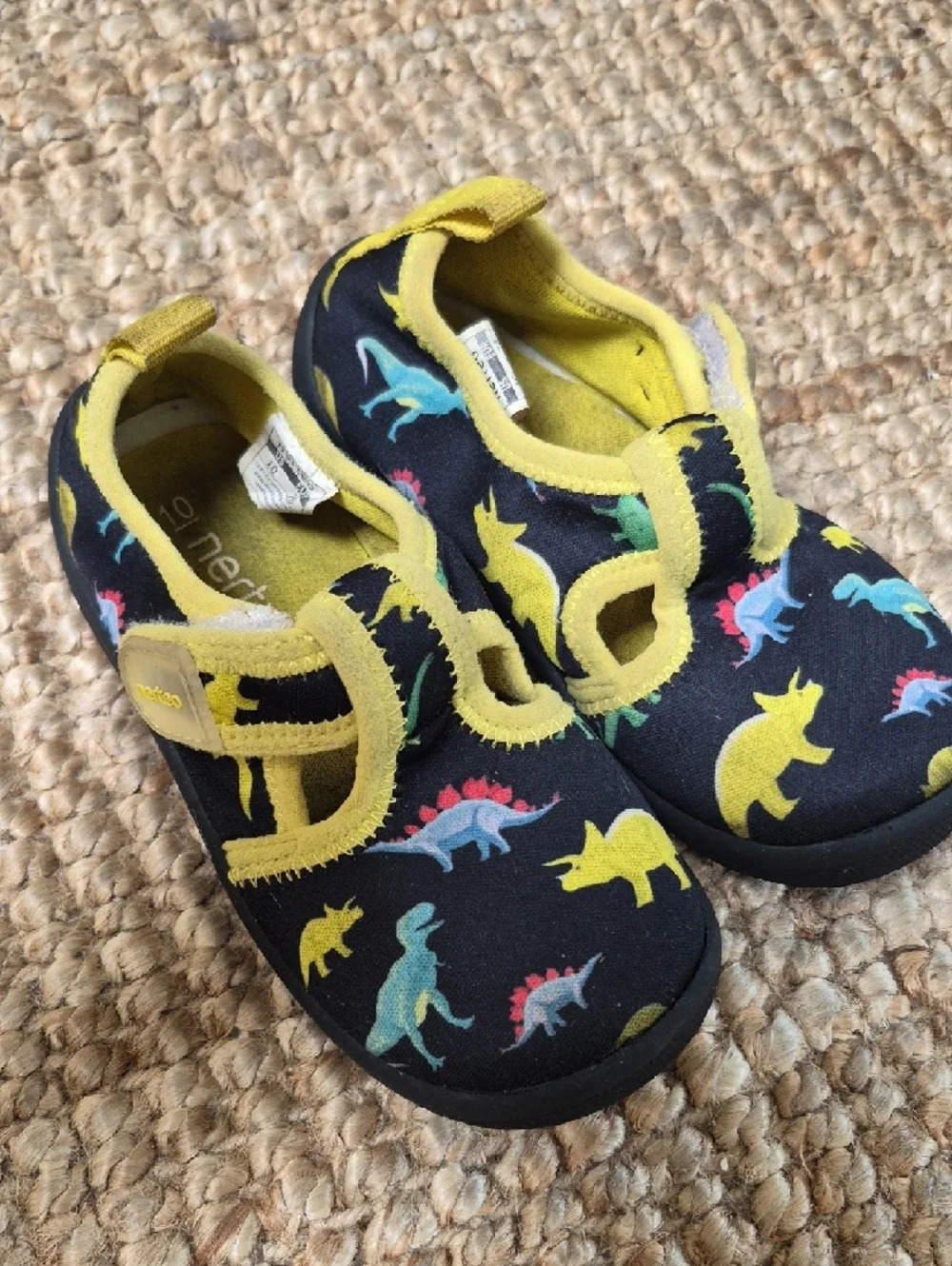 Toddler's dinosaur print water shoes are from the brand Nerteo. 10 Water Shoes